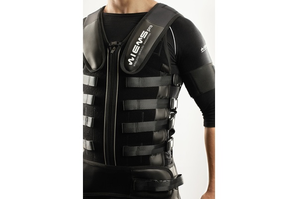 Close-up of EMS suit electrodes on muscle groups